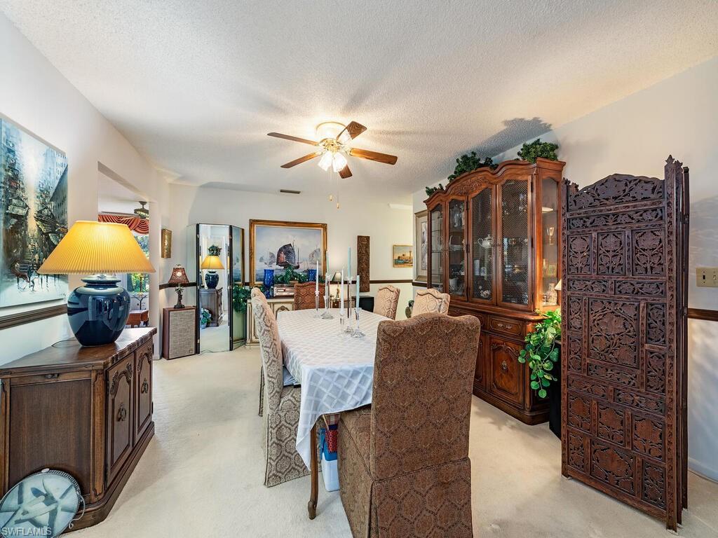 725 Pectin Road Naples, FL 34102 - Photo 8 of 13 Formal dining room.