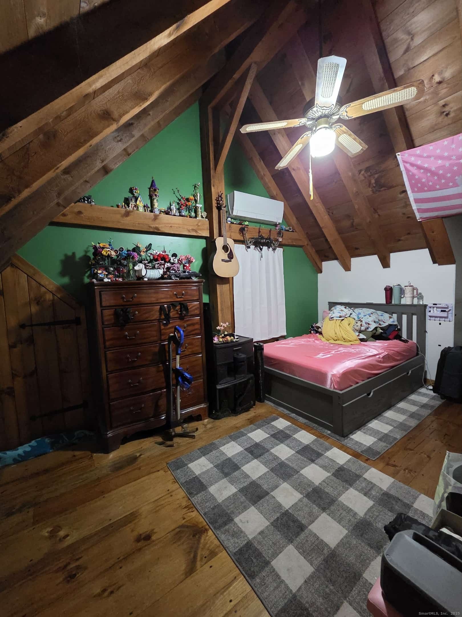 145 Perrin Road Woodstock, CT 06281 - Photo 19 of 38 a bedroom with a bed and a walk in closet