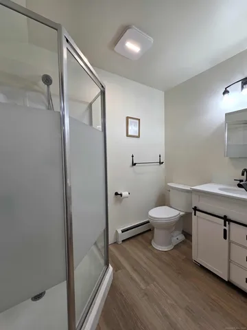 a view of a dry yard with trees