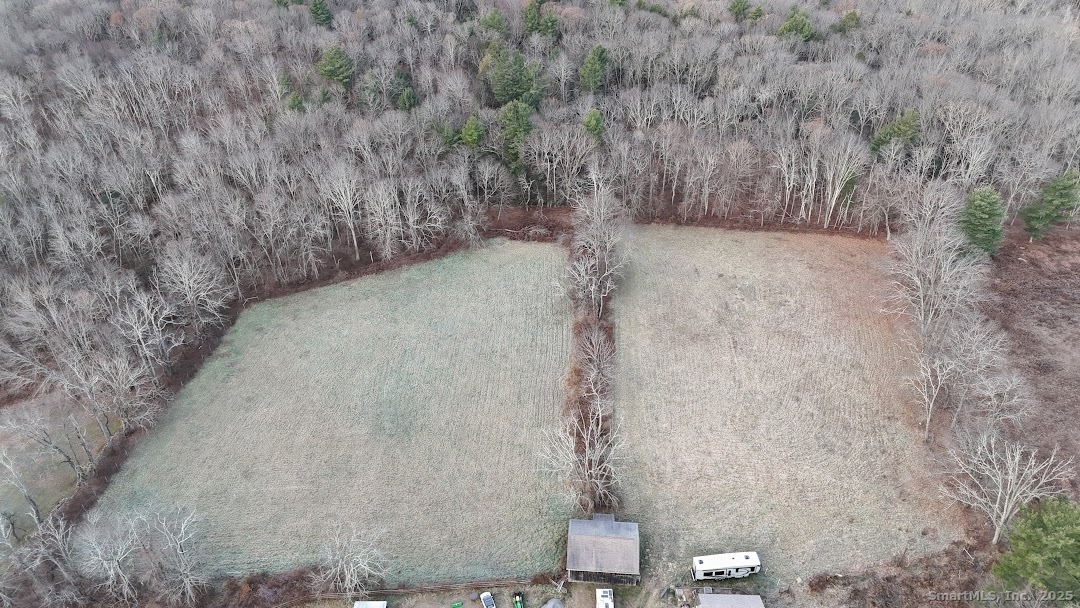 145 Perrin Road Woodstock, CT 06281 - Photo 27 of 38 a view of a dry yard with wooden fence