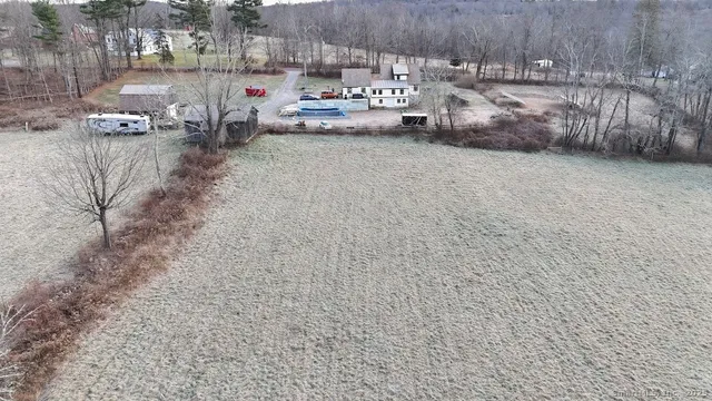a picture of a bathroom with a shower and a mirror