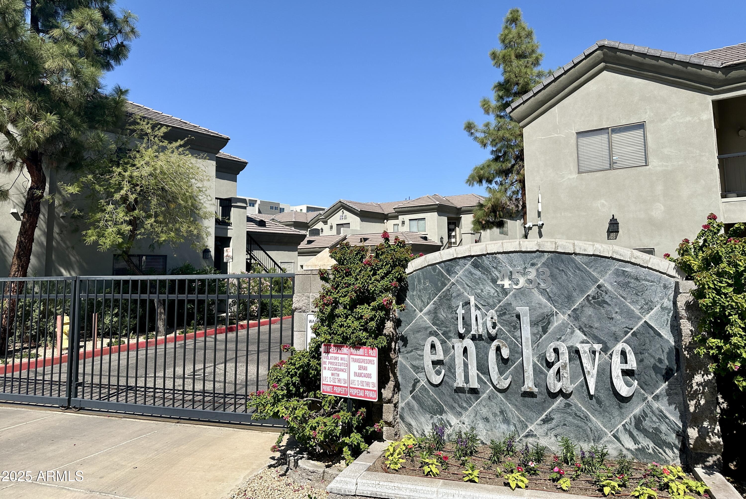 4533 North 22nd Street, Unit 127 Phoenix, AZ 85016 - Photo 1 of 30 a view of a street with a house in the background