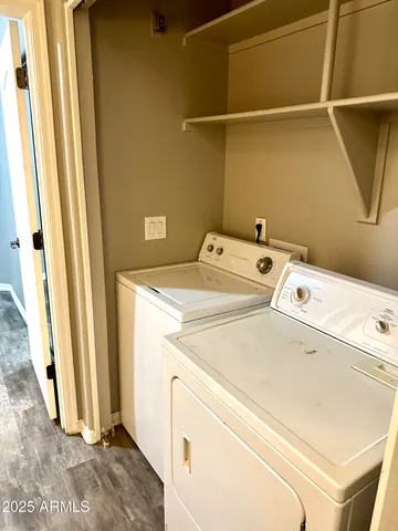 a utility room with dryer and washer