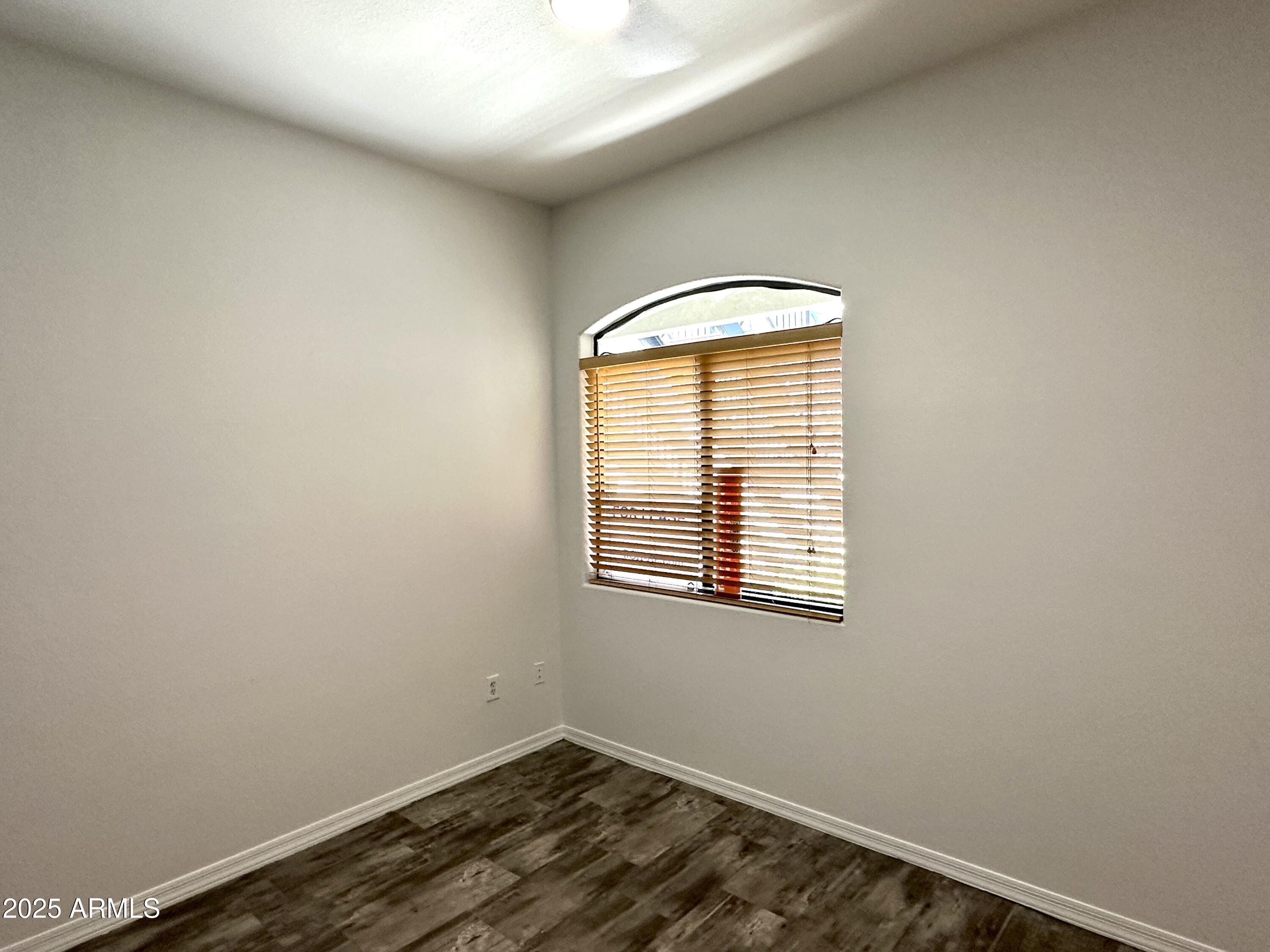4533 North 22nd Street, Unit 127 Phoenix, AZ 85016 - Photo 22 of 30 an empty room with a window