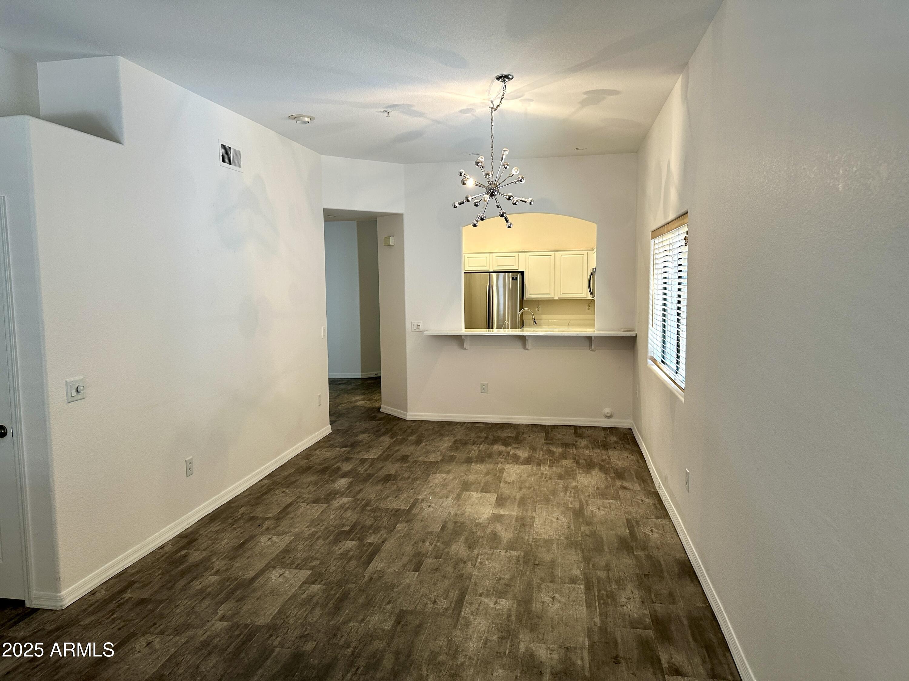 4533 North 22nd Street, Unit 127 Phoenix, AZ 85016 - Photo 24 of 30 a view of a kitchen with a sink and window