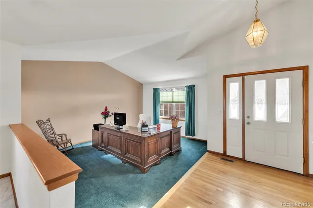 a bedroom with bed and window