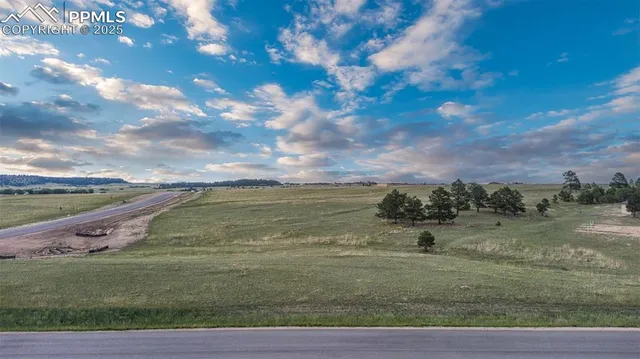 a view of a lake with a big yard