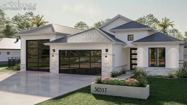 front view of a house with a yard