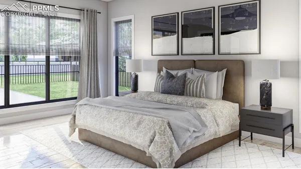 a bedroom with a bed and window