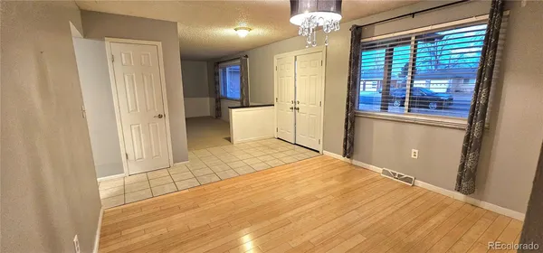 a view of a bathroom with a tub and shower