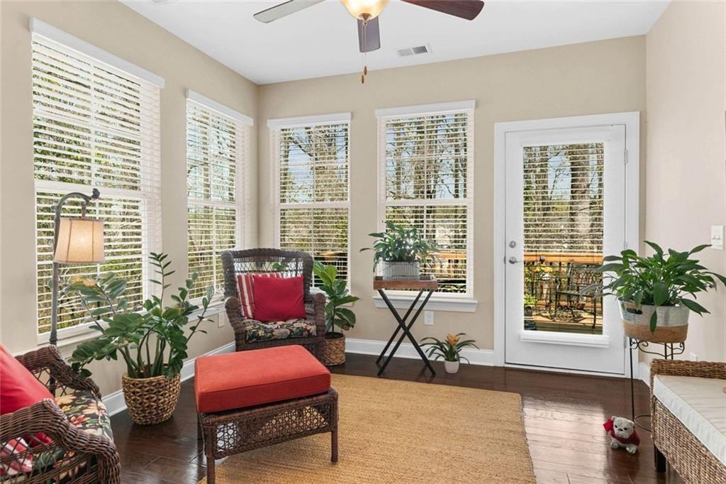 559 Bishopton Street Southeast Grayson, GA 30017 - Photo 20 of 34 a bedroom with furniture and windows