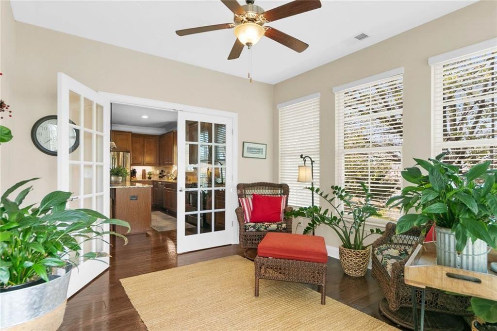 559 Bishopton Street Southeast Grayson, GA 30017 - Photo 21 of 34 a living room with furniture potted plant and a window