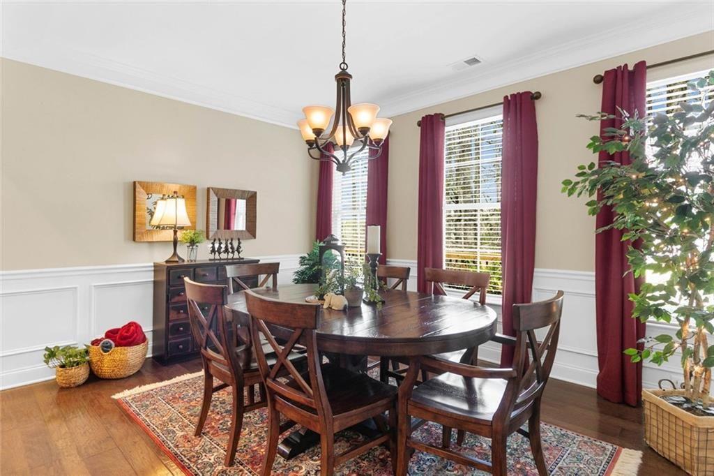 559 Bishopton Street Southeast Grayson, GA 30017 - Photo 22 of 34 a view of a dining room with furniture and window