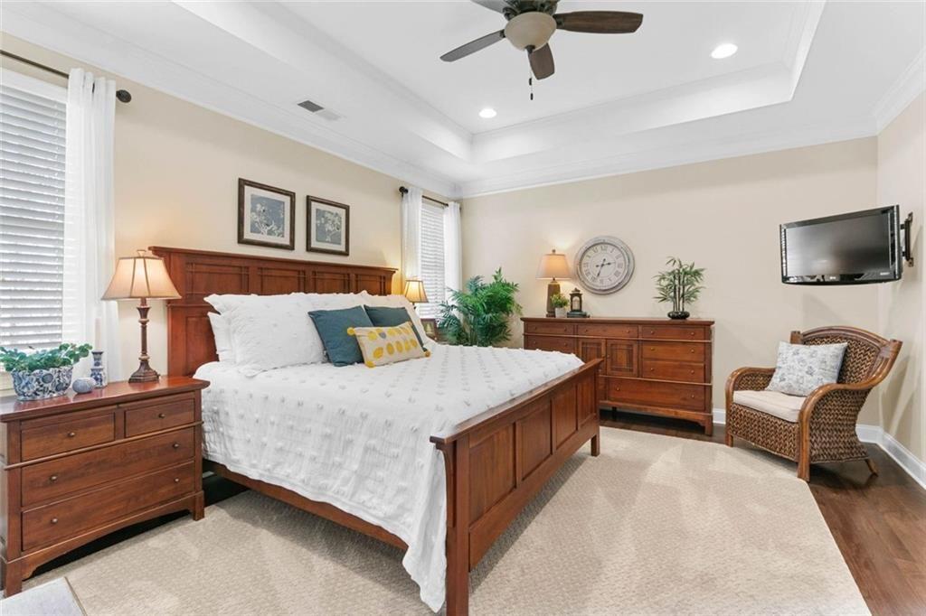 559 Bishopton Street Southeast Grayson, GA 30017 - Photo 23 of 34 a bed room with a bed window and a chair