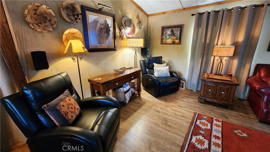 81641 Ave 48, Unit SPC 104 Indio, CA 92201 - Photo 18 of 50 a living room with furniture and a window