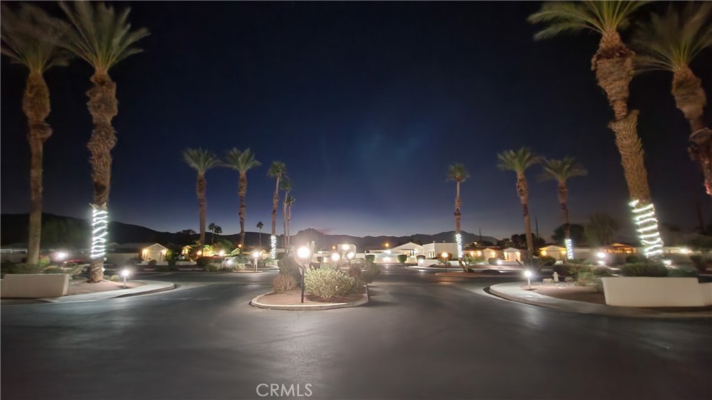 81641 Ave 48, Unit SPC 104 Indio, CA 92201 - Photo 49 of 50 a view of a street with lots of lights
