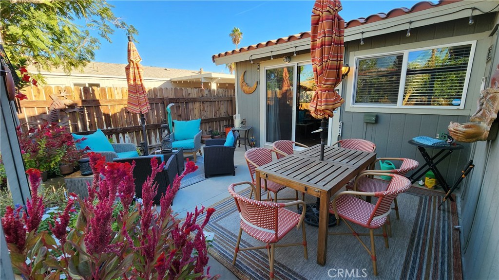81641 Ave 48, Unit SPC 104 Indio, CA 92201 - Photo 8 of 50 a view of an outdoor sitting area with furniture