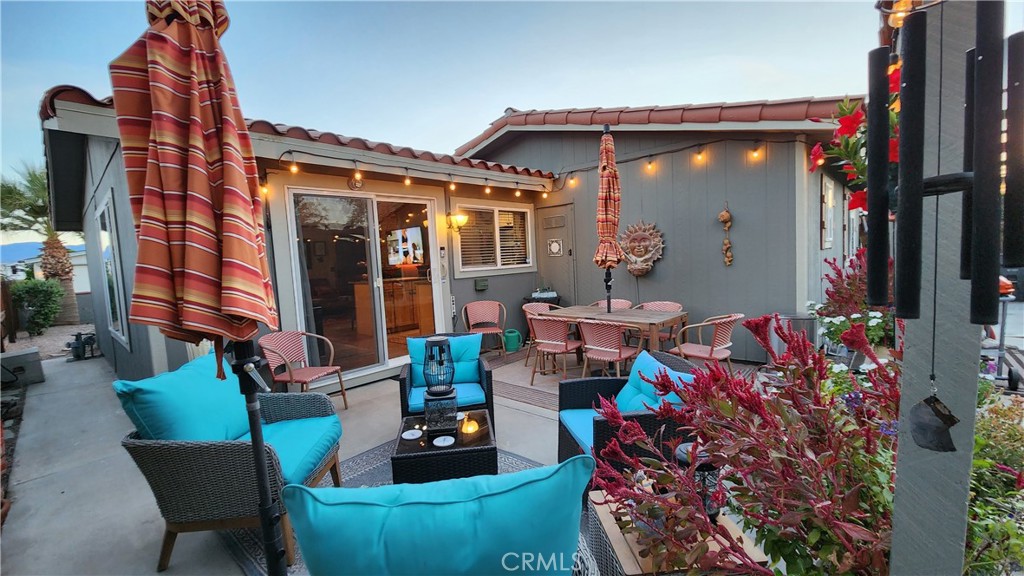 81641 Ave 48, Unit SPC 104 Indio, CA 92201 - Photo 10 of 50 a front view of house with outdoor seating space