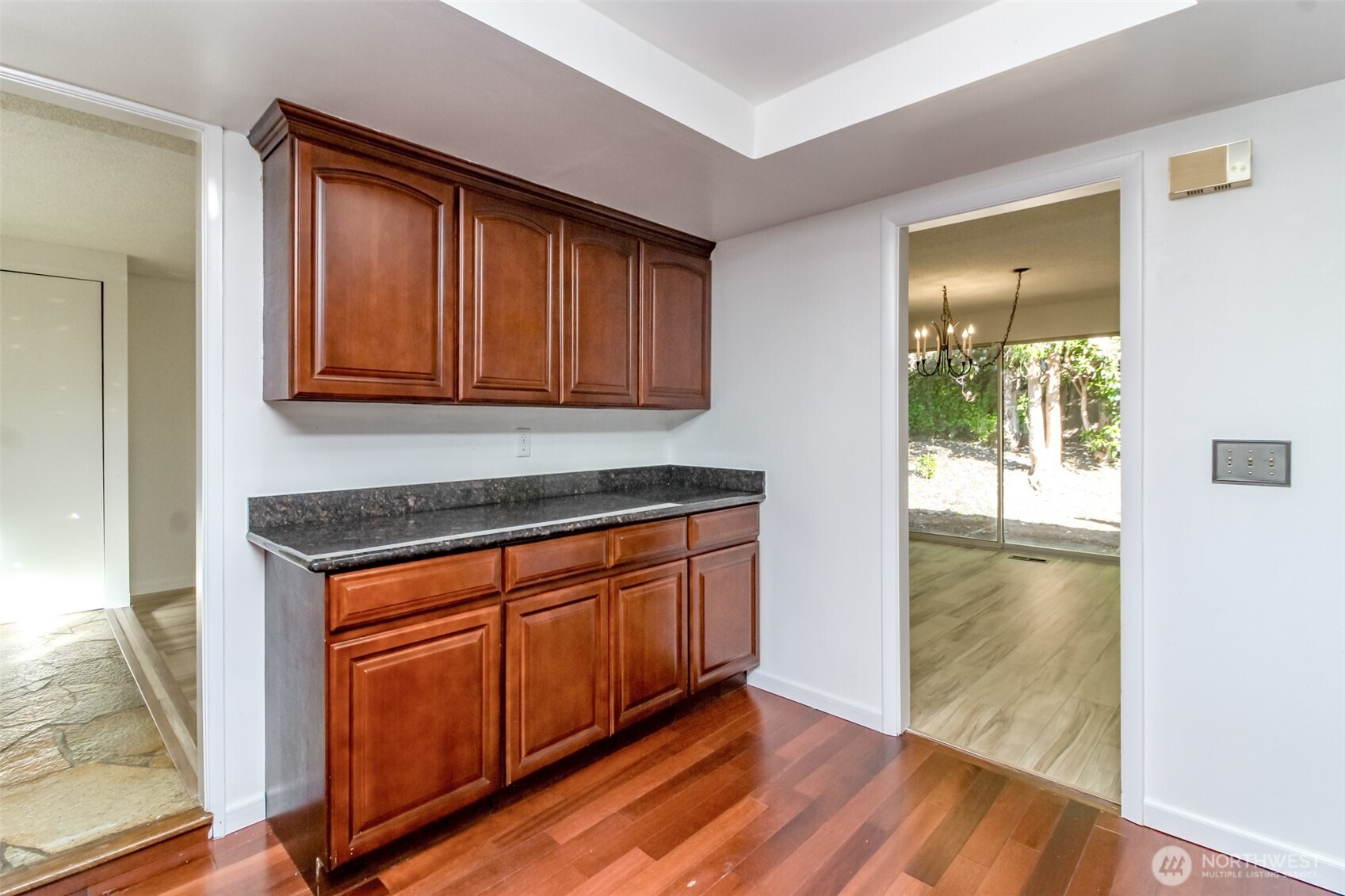 32622 39th Avenue Southwest Federal Way, WA 98023 - Photo 14 of 40 a hallway with wooden floor and a sink
