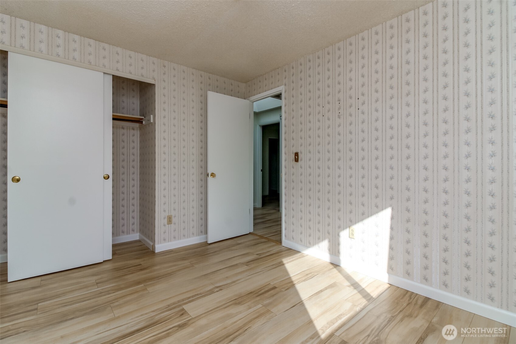 32622 39th Avenue Southwest Federal Way, WA 98023 - Photo 21 of 40 a view of an empty room with wooden floor