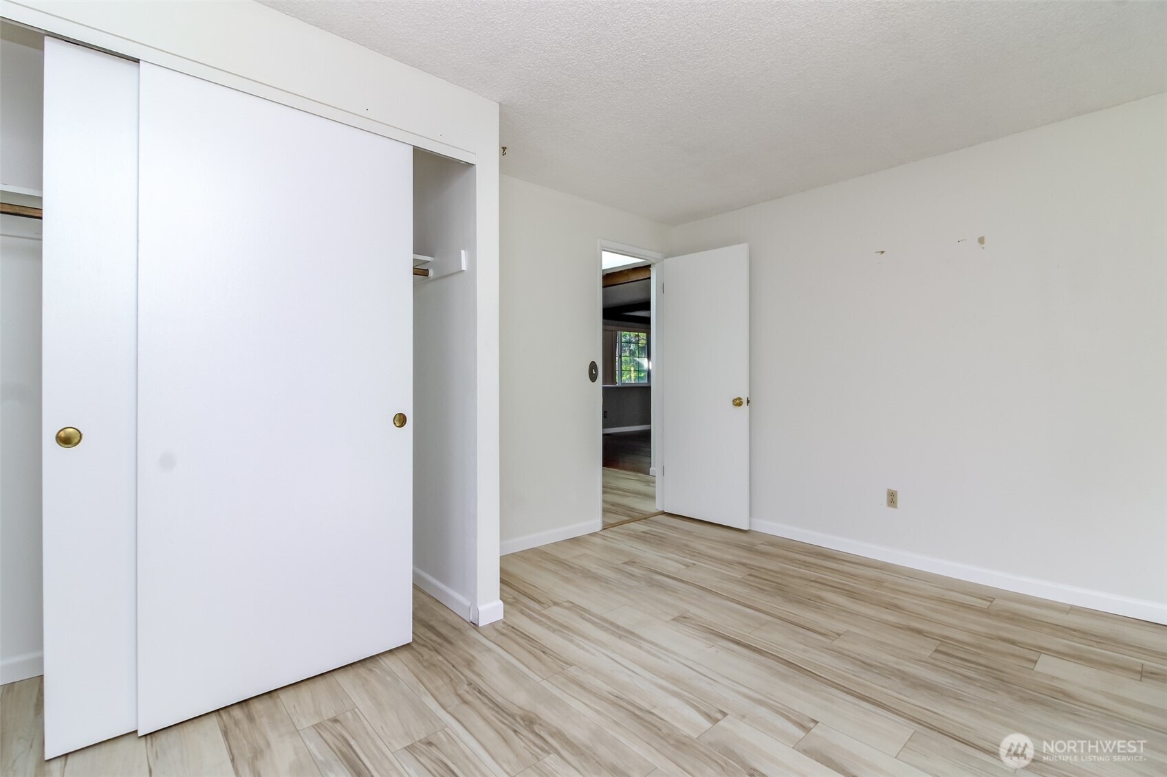 32622 39th Avenue Southwest Federal Way, WA 98023 - Photo 23 of 40 a view of an empty room with wooden floor