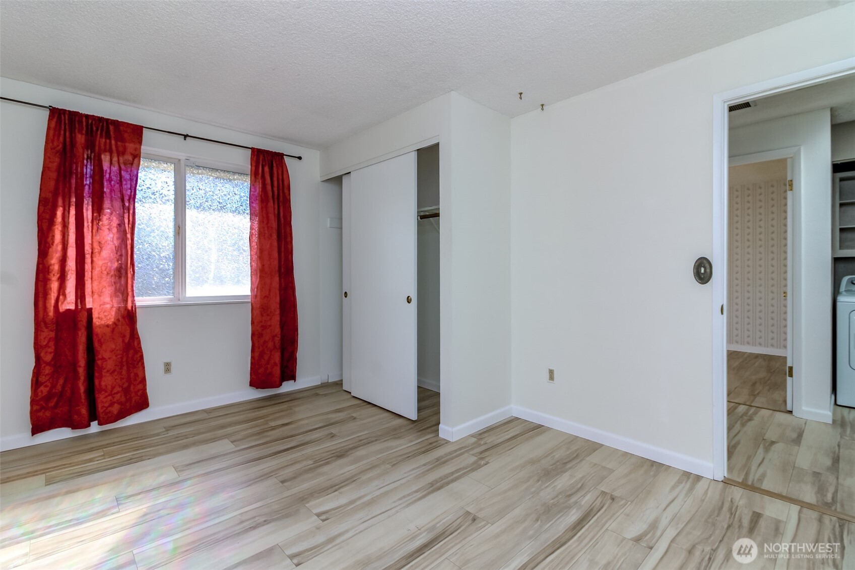 32622 39th Avenue Southwest Federal Way, WA 98023 - Photo 24 of 40 a view of a room with wooden floor and door