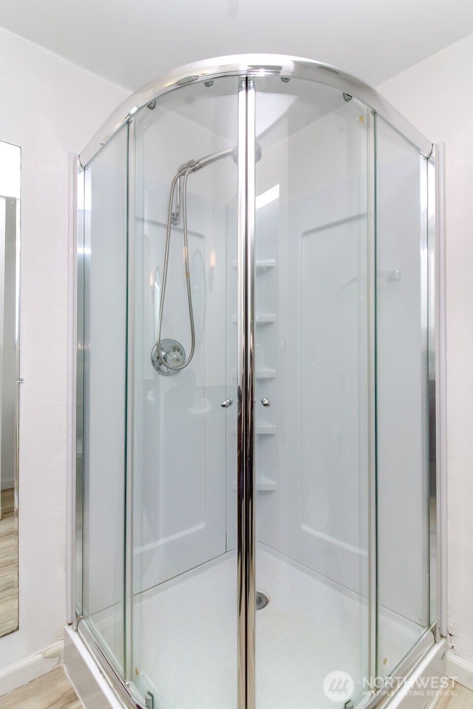 32622 39th Avenue Southwest Federal Way, WA 98023 - Photo 30 of 40 a bathroom with a glass shower door
