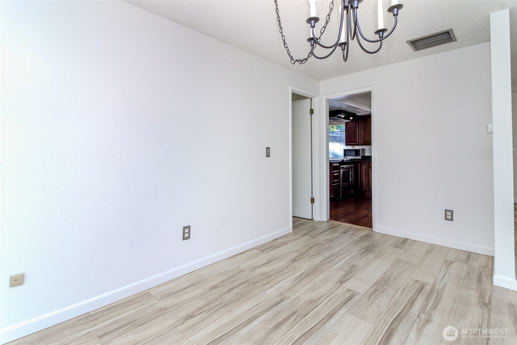 32622 39th Avenue Southwest Federal Way, WA 98023 - Photo 9 of 40 a view of a room with wooden floor and a window