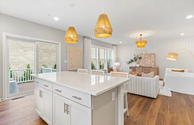 a view of counter top space with furniture and wooden floor