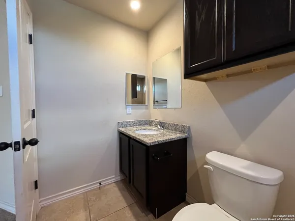 a bathroom with a sink and a toilet