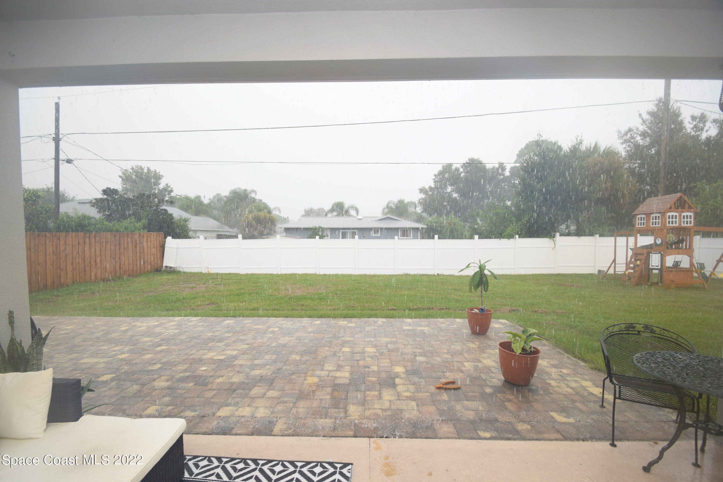 991 Castile Road Southeast Palm Bay, FL 32909 - Photo 54 of 59 Additional pavers off porch