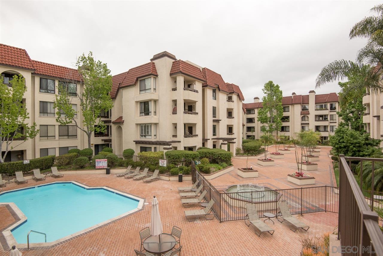 5805 Friars Road, Unit 2101 San Diego, CA 92110 - Photo 13 of 25 The courtyard outside the home showing the closeness of the pool and community center area.