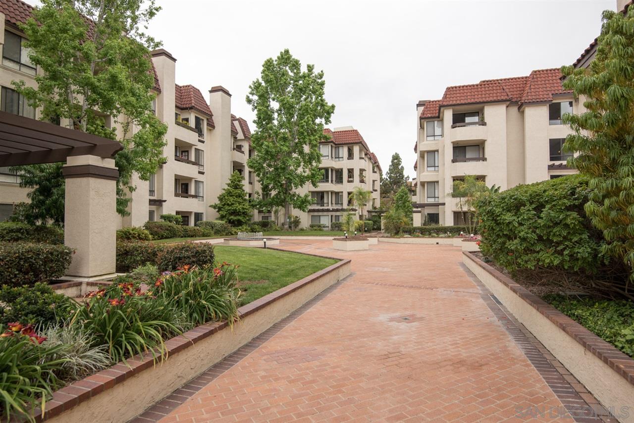 5805 Friars Road, Unit 2101 San Diego, CA 92110 - Photo 14 of 25 Looking from the east view corridor back towards the unit.