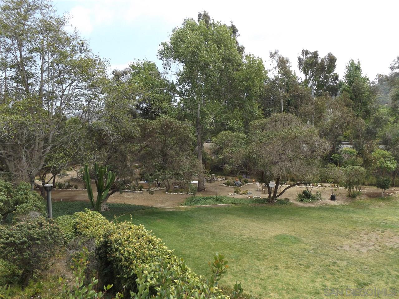 5805 Friars Road, Unit 2101 San Diego, CA 92110 - Photo 18 of 25 Secret little garden area in the southeast corner of the property against the San Diego River greenery.