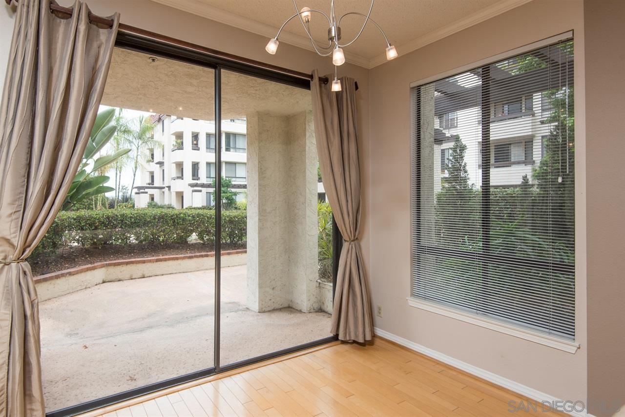 5805 Friars Road, Unit 2101 San Diego, CA 92110 - Photo 3 of 25 Mirrored dining area with the adjacent slider providing the view to the east.