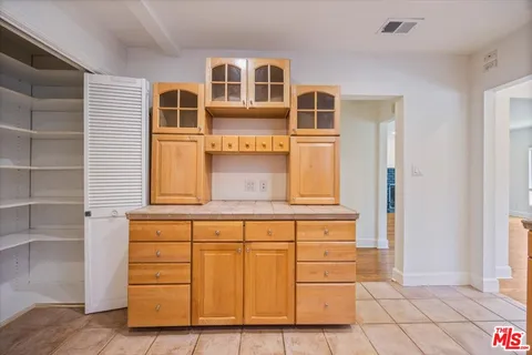 a view of a refrigerator and window