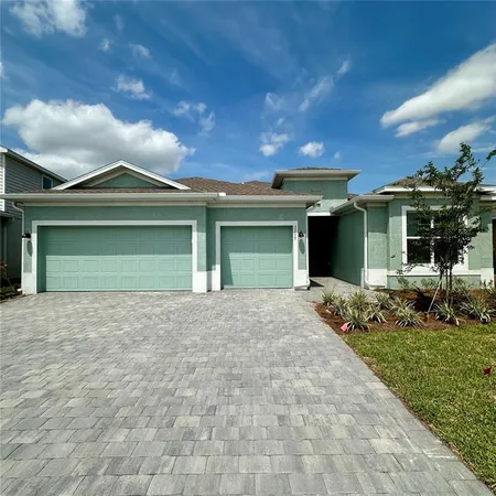 front view of a house with a garden