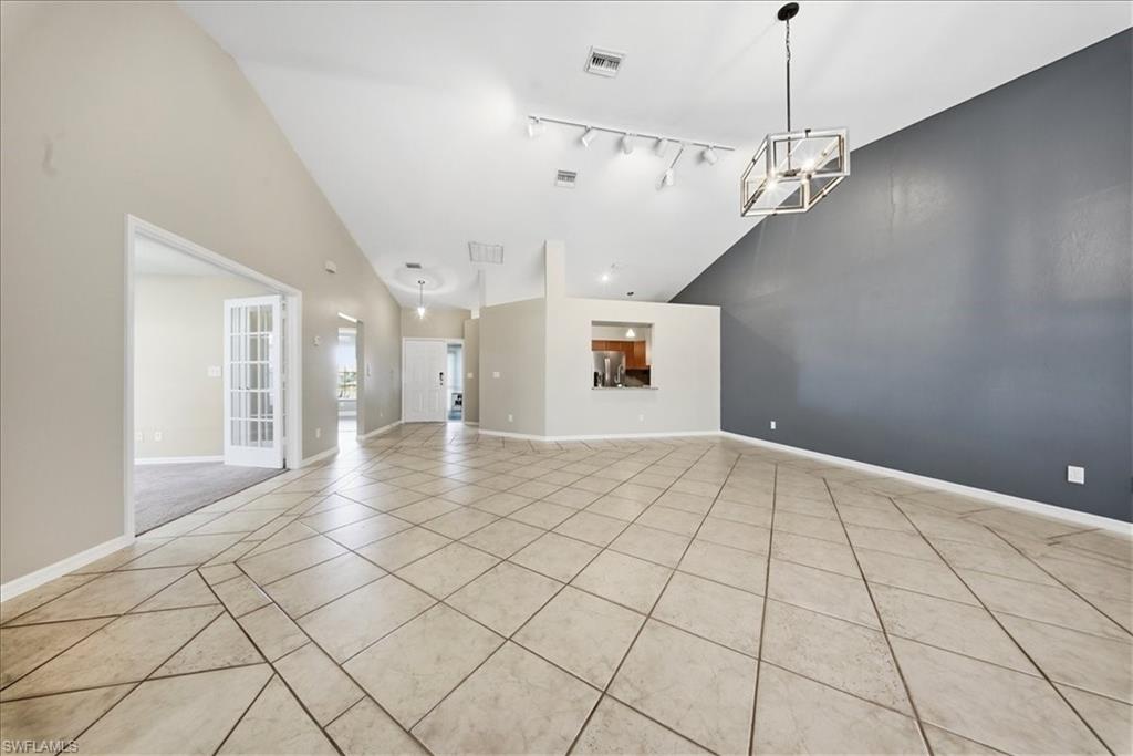430 St Andrews Boulevard, Unit 6 Naples, FL 34113 - Photo 13 of 47 a view of an empty room and window