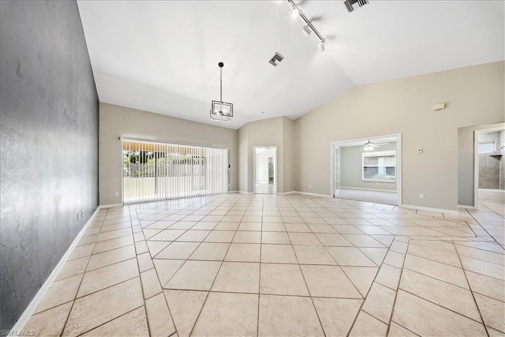 430 St Andrews Boulevard, Unit 6 Naples, FL 34113 - Photo 14 of 47 a view of an empty room and window