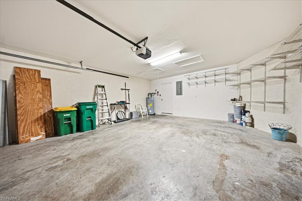 430 St Andrews Boulevard, Unit 6 Naples, FL 34113 - Photo 29 of 47 a view of a garage with furniture
