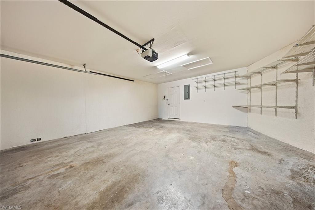 430 St Andrews Boulevard, Unit 6 Naples, FL 34113 - Photo 31 of 47 a view of a garage