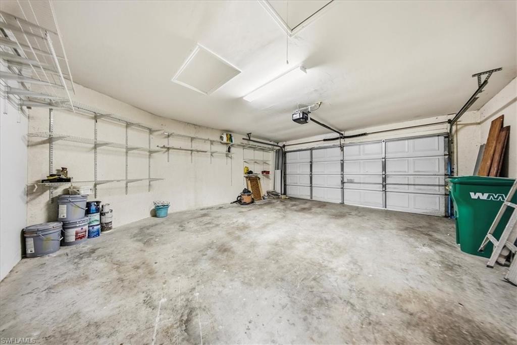 430 St Andrews Boulevard, Unit 6 Naples, FL 34113 - Photo 32 of 47 a view of a garage