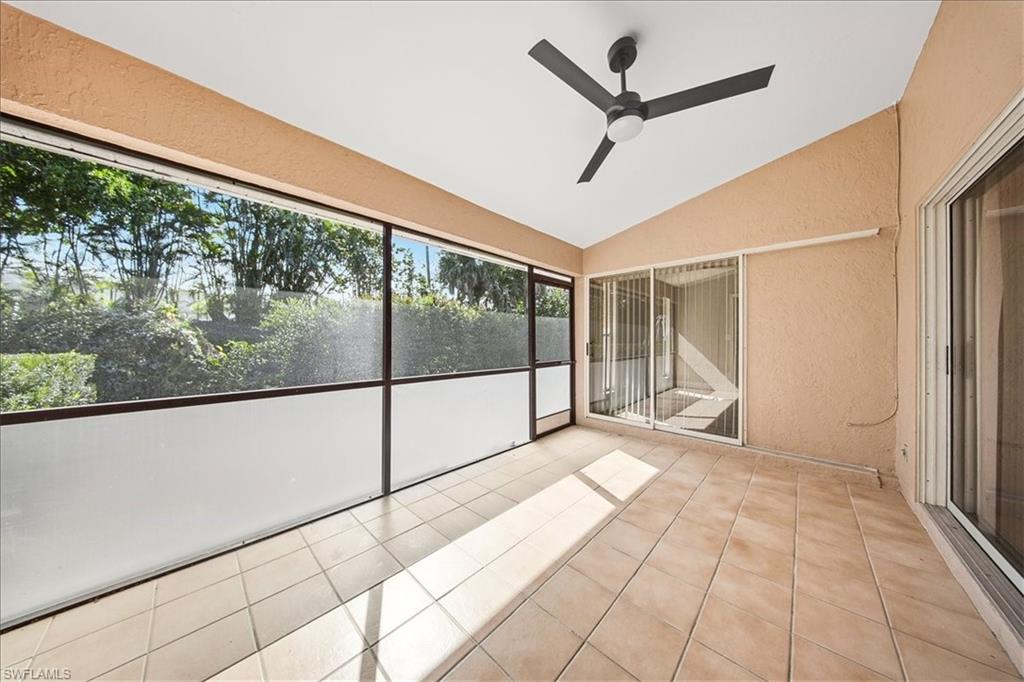 430 St Andrews Boulevard, Unit 6 Naples, FL 34113 - Photo 33 of 47 a view of a room with a large window