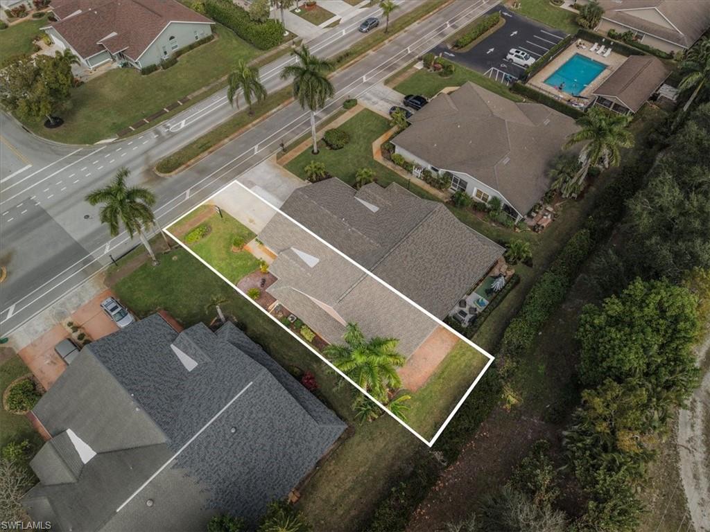 430 St Andrews Boulevard, Unit 6 Naples, FL 34113 - Photo 36 of 47 an aerial view of a tennis ground