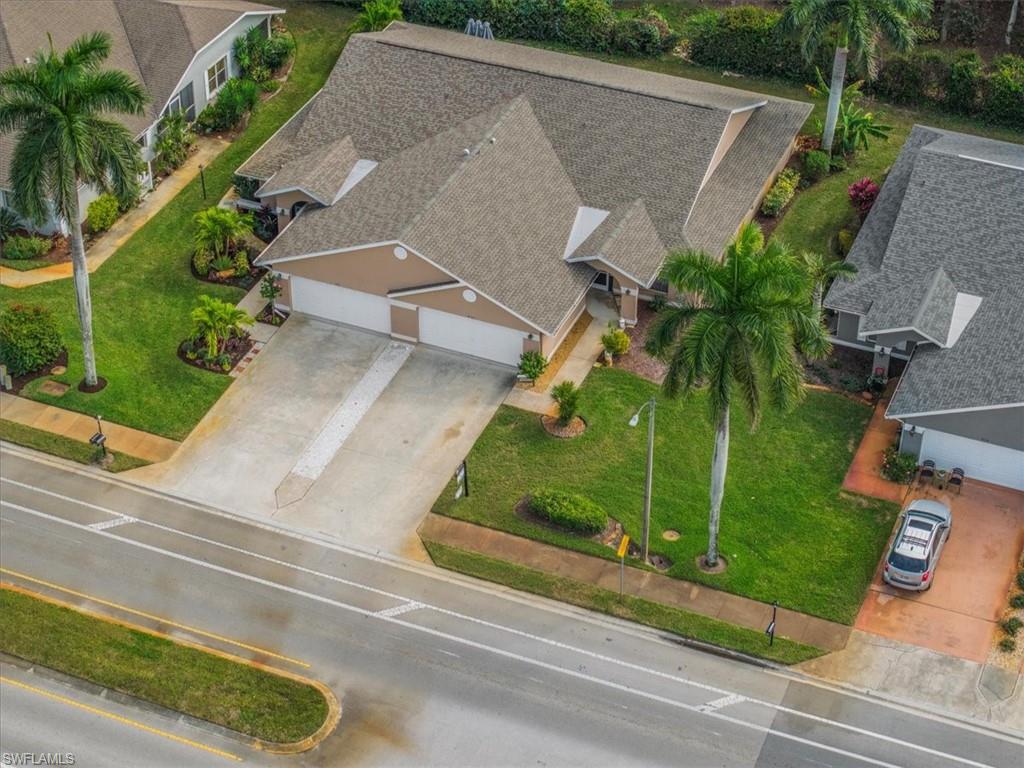 430 St Andrews Boulevard, Unit 6 Naples, FL 34113 - Photo 43 of 47 an aerial view of a house