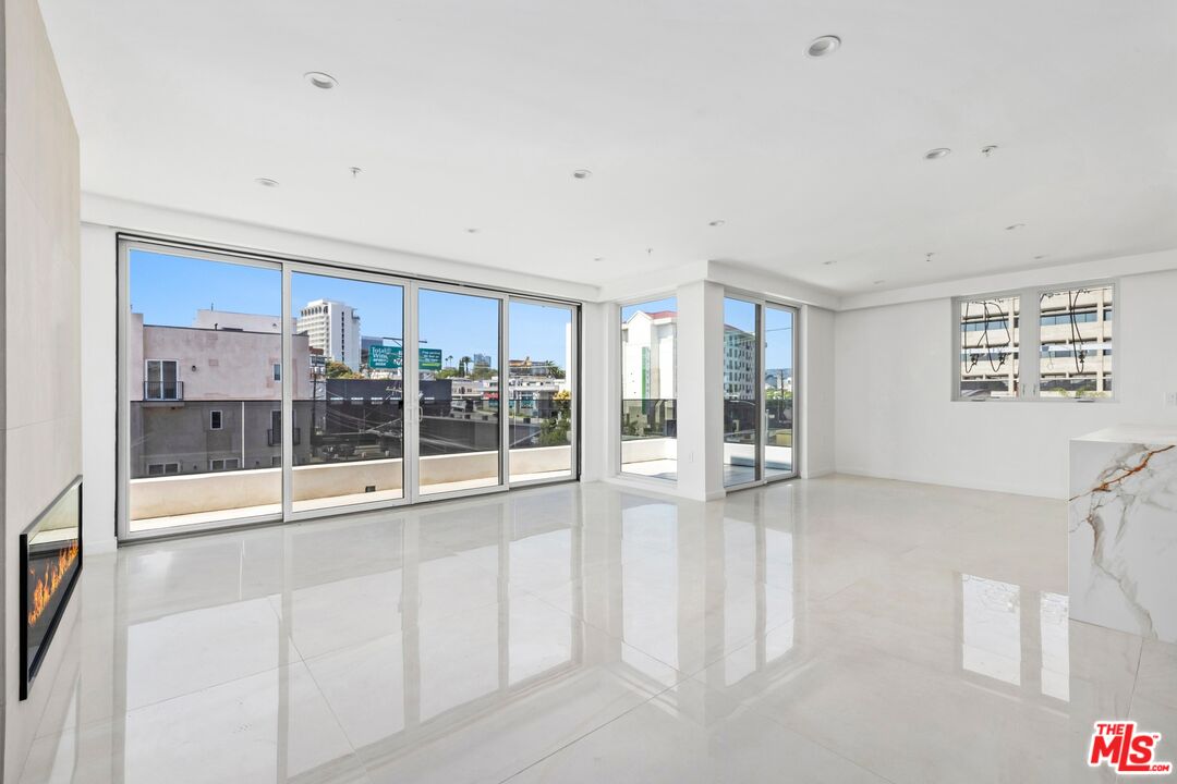 1414 1/2 South Beverly Drive, Unit 402 Los Angeles, CA 90035 - Photo 1 of 15 a view of an entryway with wooden floor