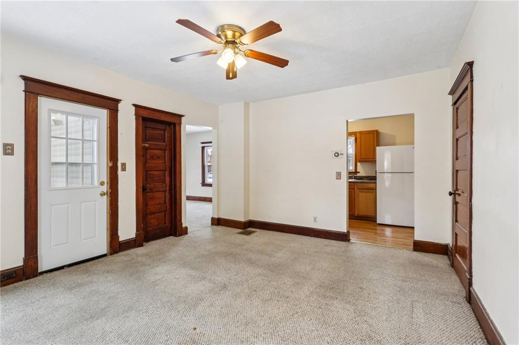14 Elm Street Bessemer, PA 16112 - Photo 11 of 29 a view of empty room with a kitchen
