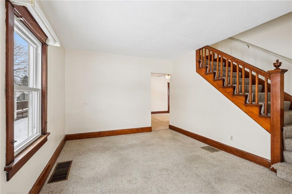 14 Elm Street Bessemer, PA 16112 - Photo 15 of 29 a view of an empty room with stairs