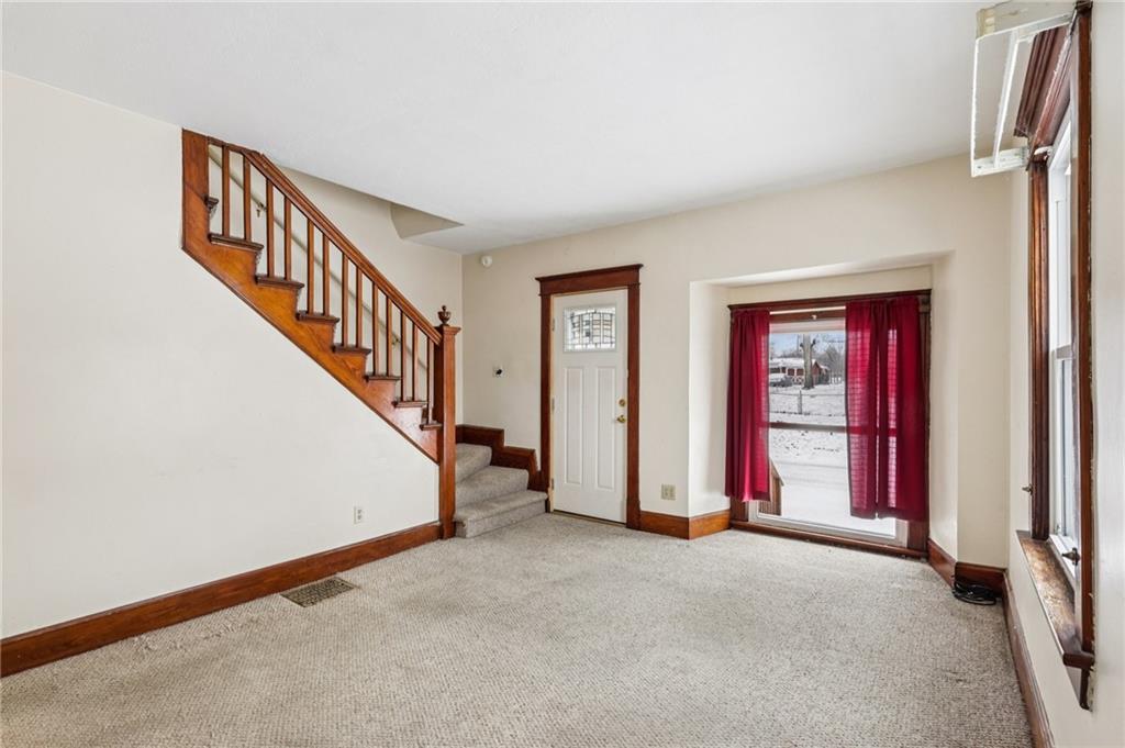14 Elm Street Bessemer, PA 16112 - Photo 16 of 29 a view of a livingroom with stairs