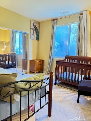 a view of kitchen with sink and window